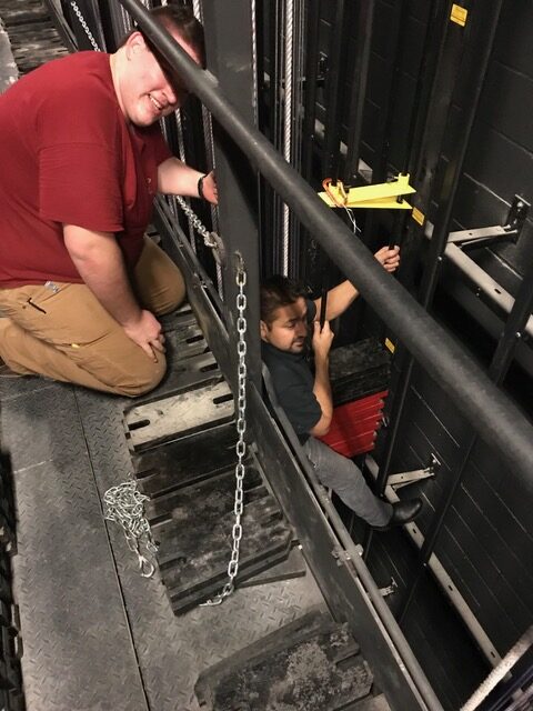 Crew on stage scaffolding